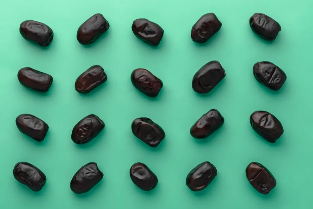 Bam Mazafati dates arranged on green